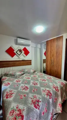 Uma cama ou camas num quarto em Beach Class