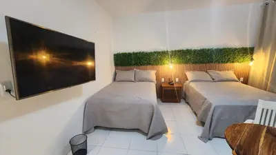 Uma cama ou camas num quarto em Casa Jo Fortim