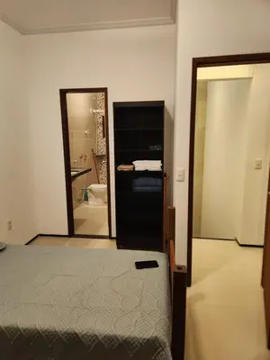 Uma cama ou camas num quarto em Dúplex Lagoa