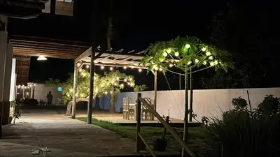 Um jardim no exterior de Casa na Pinguela