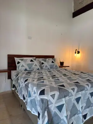 Uma cama ou camas num quarto em Casa na Pinguela