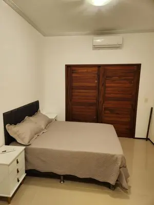 Uma cama ou camas num quarto em Dúplex Lagoa