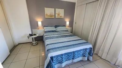 Uma cama ou camas num quarto em Apartamento Beira Mar Fortaleza