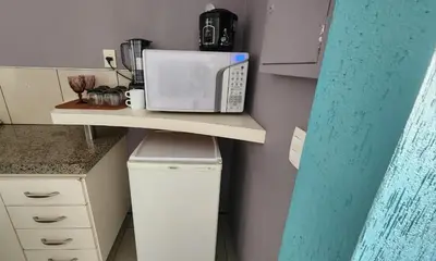 A cozinha ou kitchenette de Apartamento Beira Mar Fortaleza