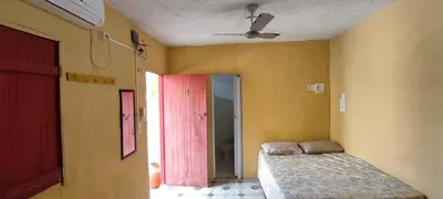 Uma cama ou camas num quarto em casa n 8 jeri