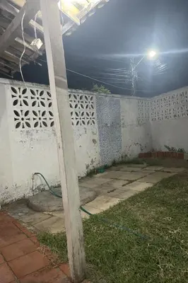 Um jardim no exterior de Casa Caponga