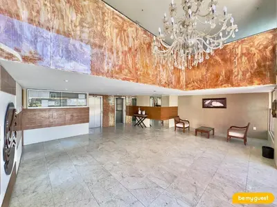 Uma área de estar em Caravelle Residencial