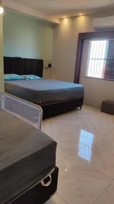 Uma cama ou camas num quarto em Trairí House