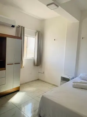 Uma cama ou camas num quarto em Apartamento inteiro para Casal 404