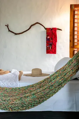 Uma cama ou camas num quarto em Casa Perobinha