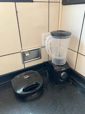 A cozinha ou kitchenette de 1 Quarto passos da praia