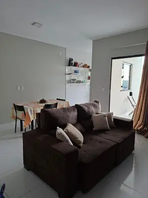 Uma área de estar em Conforto pé na areia