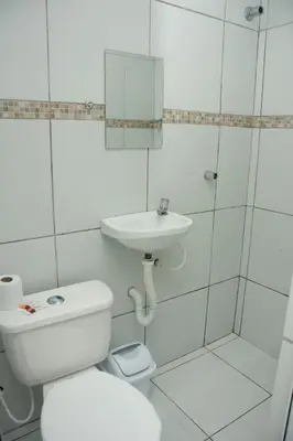 Uma casa de banho em Pousada Moda New