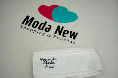 Um certificado, prémio, placa ou documento mostrado em Pousada Moda New