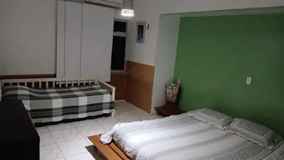 Uma cama ou camas num quarto em Aconchego na praia do futuro