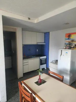 A cozinha ou kitchenette de Flat vista para o mar