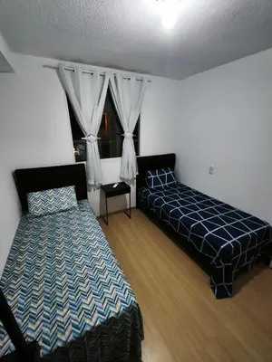 Uma cama ou camas num quarto em Mirante Clube