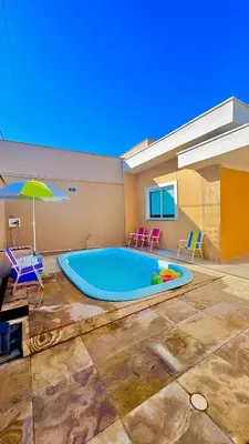 A piscina em ou perto de CASA MARIANNA - Paracuru perto de tudo 3qts piscina