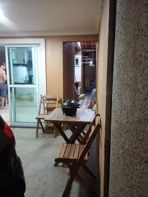 Uma área de estar em CASA MARIANNA - Paracuru perto de tudo 3qts piscina