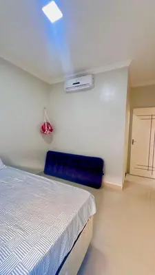 Uma cama ou camas num quarto em CASA MARIANNA - Paracuru perto de tudo 3qts piscina