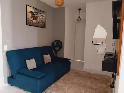 Uma área de estar em Apartment 100 meters from the beach Crocobeach