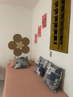 Uma cama ou camas num quarto em Casa De Vó