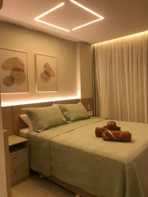 Uma cama ou camas num quarto em Studio Topázio no Meireles próximo a Praia de Iracema
