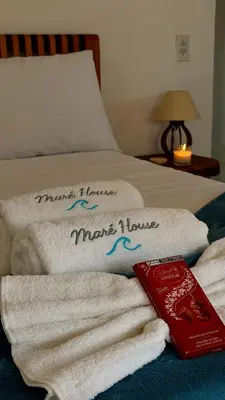 Uma cama ou camas num quarto em Maré House