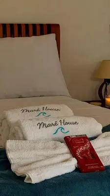 Uma cama ou camas num quarto em Maré House