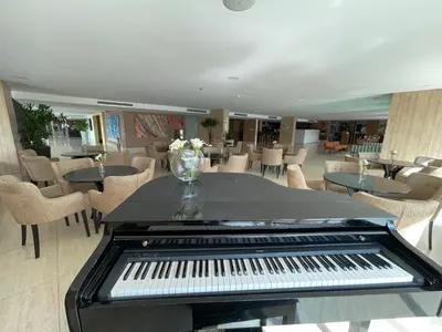 Uma área de estar em Gran Mareiro Hotel