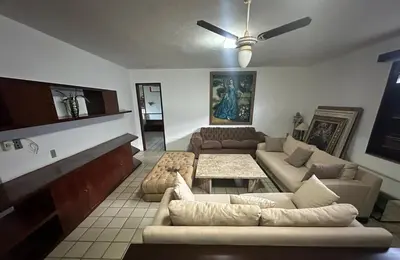 Uma área de estar em Beach house in Porto das Dunas with four suites