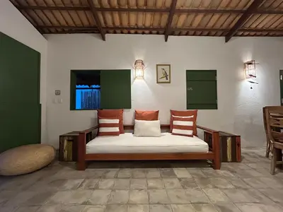 Uma cama ou camas num quarto em Casa Sabiá, Praia de Peroba, CE