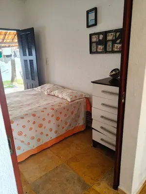Uma cama ou camas num quarto em Nascimento BEACH