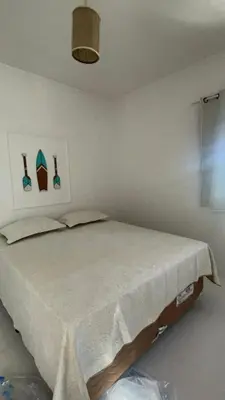 Uma cama ou camas num quarto em Casa Carnaubas