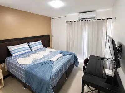Uma cama ou camas num quarto em Pé na Areia com Piscina Vista Mar- EcoParadise-120