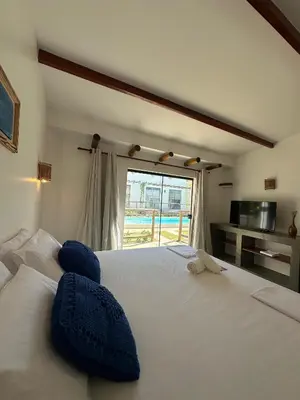 Uma cama ou camas num quarto em BaleiaLofts Kite Village