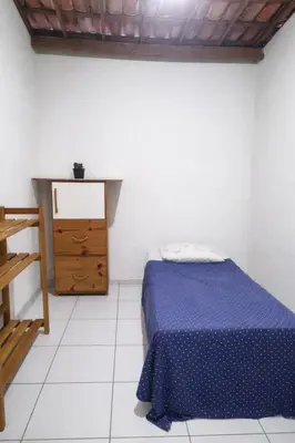 Uma cama ou camas num quarto em Refúgio Rústico