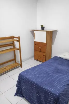 Uma cama ou camas num quarto em Refúgio Rústico