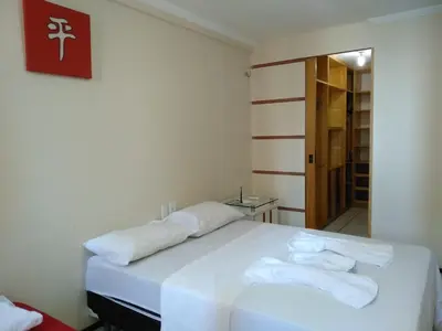 Uma cama ou camas num quarto em Porto de Iracema- Ferias Temporada Fortaleza