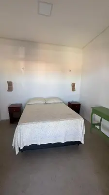 Uma cama ou camas num quarto em Casa Dunas Baleia