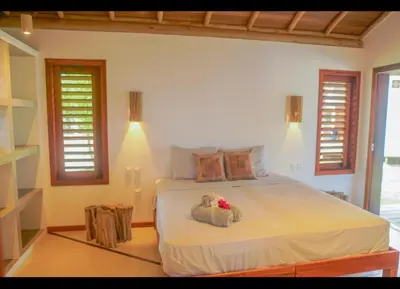 Uma cama ou camas num quarto em Villa Mandala