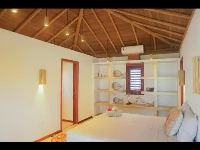 Uma cama ou camas num quarto em Villa Mandala