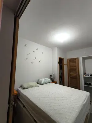 Uma cama ou camas num quarto em Casa mirante de Parajuru