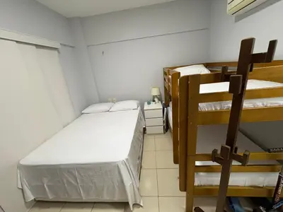 Uma cama ou camas num quarto em Apartamento Porto das Dunas