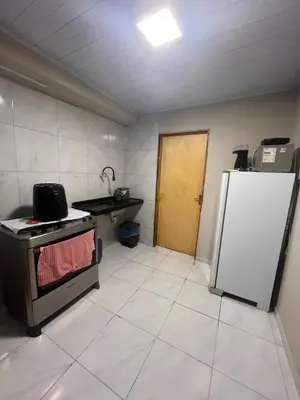 A cozinha ou kitchenette de Kit net da flor