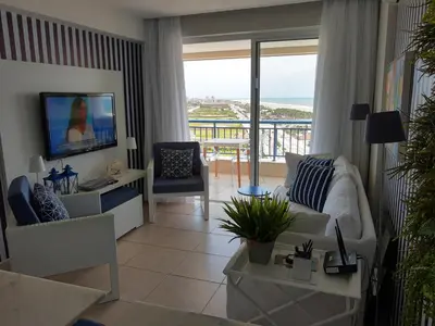 Uma televisão e/ou sistema de entretenimento em Apto Charmoso Praia do Futuro - Fortaleza CE
