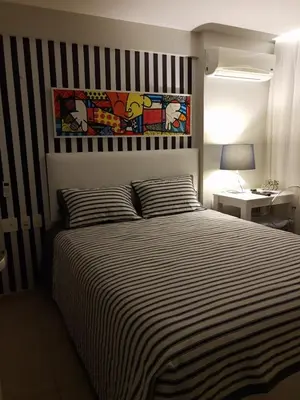 Uma cama ou camas num quarto em Apto Charmoso Praia do Futuro - Fortaleza CE