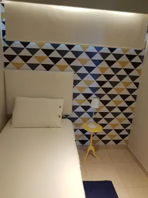 Uma cama ou camas num quarto em Apto Charmoso Praia do Futuro - Fortaleza CE