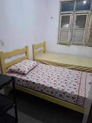 Uma cama ou camas num quarto em Casa do Milota