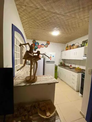 A cozinha ou kitchenette de Casas do Ton na Praia da Redonda 01